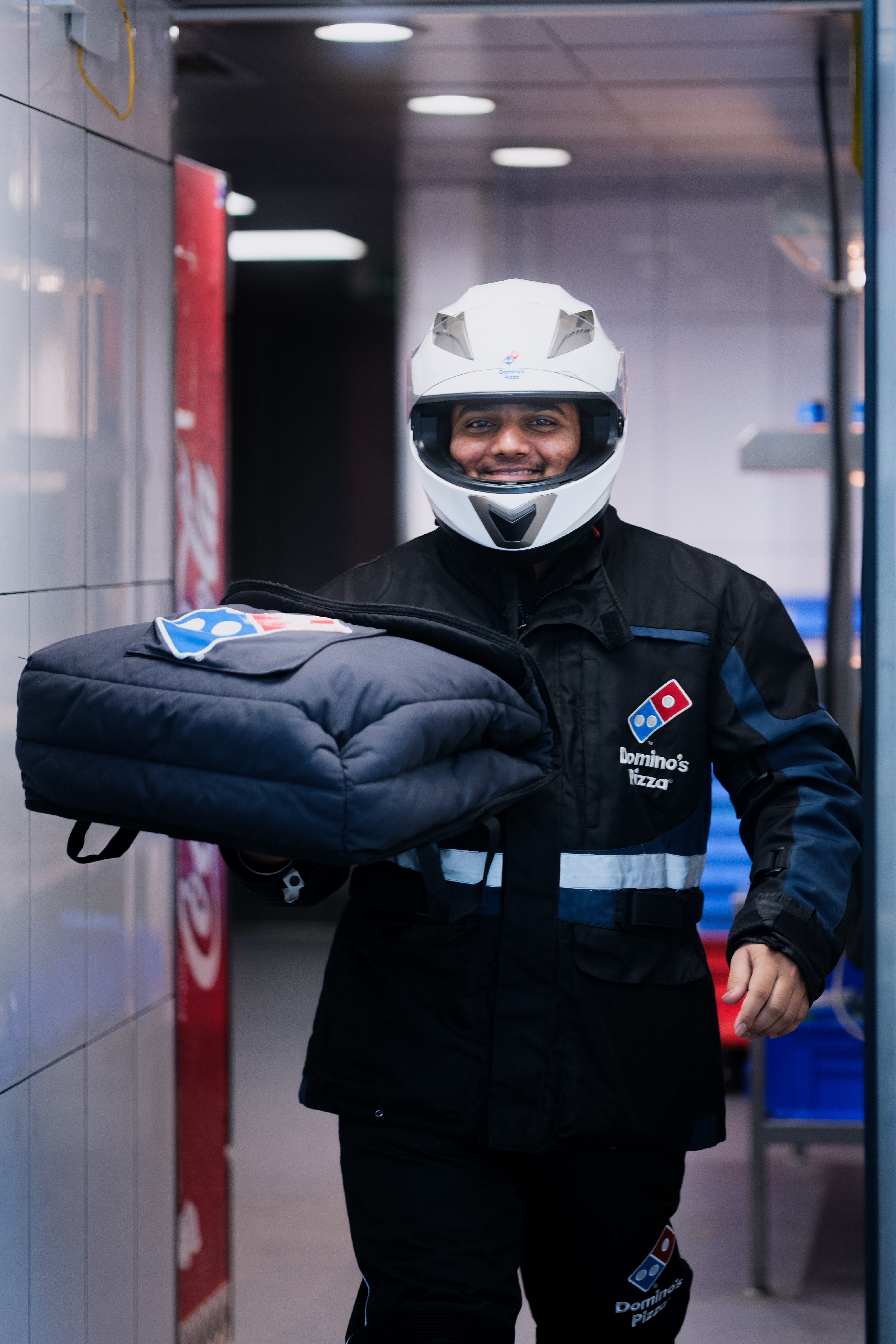 Delivery Rider Simling Delivery Riders and Drivers | Domino's