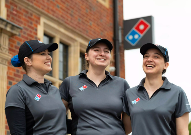 Domino's staff smiling
